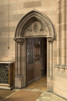 West transept. Door to vestry from south.