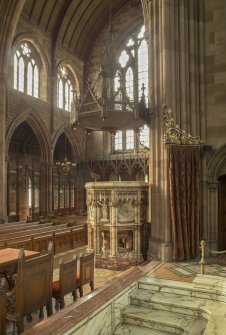 Pulpit and west transept from chancel to north east.