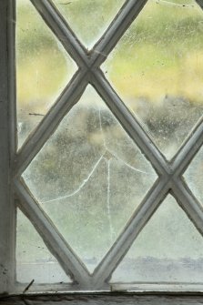 East window. Detail of writing etched on glass. (Image reversed for legibility.) 'The Glen... peoples were here 1845 the Glencalvie Ross'