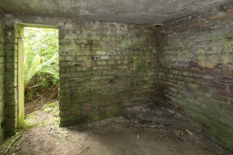 Ex D.O. post.  Interior view of stove base in south east corner of observation room.