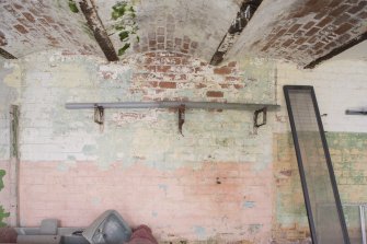 Interior. Detail of barrel vaulted ceiling and brackets in crew shelter.