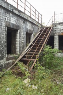 6-inch gun battery. View of stair from W.