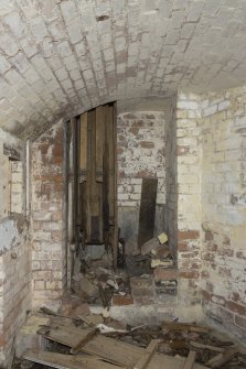 Interior of NW shell store. Detail of No. 1 gun cartridge hoist.