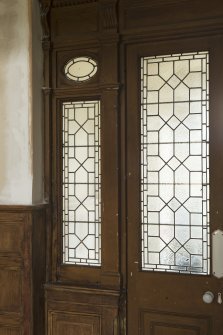 Ground floor, hall, detail of glass in door of porch