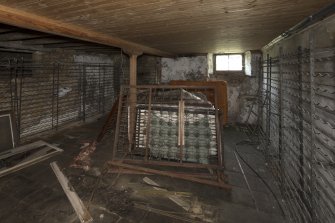 Basement, wine cellar with timber ceiling, view showing wine racks from north