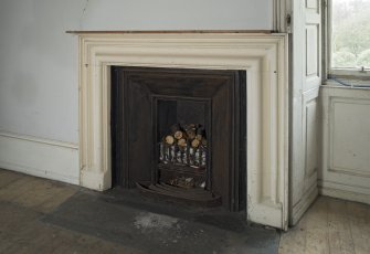 1st floor, south east bedroom, view of fireplace