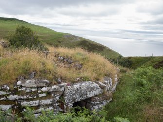 View across Ousdale Burn broch, facing east, including lintel over entrance passage