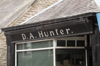 View of fascia with signage and integrated blind box.