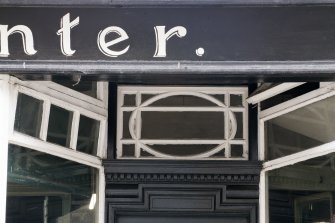 Detail of fanlight and hopper-opening ventilating windows.