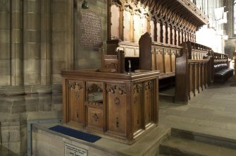Crossing, view of box with chair at west end of north choir stalls
