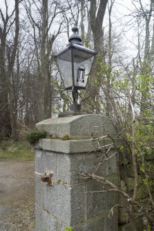 Detail of gate pier with lamp.