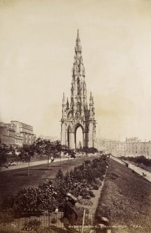 View looking east at Scott Monument and Gardens, Edinburgh.
Titled 'SCOTT MONT, EDINBURGH, 235.'
Photograph Album 25  Mr Dog Album