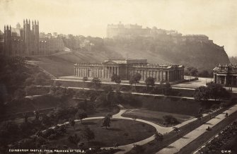 Distant view of Edinburgh Castle from Princes Street also showing National Gallery and Princes Street Gardens.
Titled 'Edinburgh Castle from Princes Street, 156A, G.W.W.'
PHOTOGRAPH ALBUM No.25: MR DOG ALBUM.