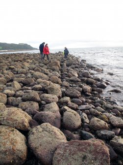 View along boulder wall on east side of harbour, looking south.