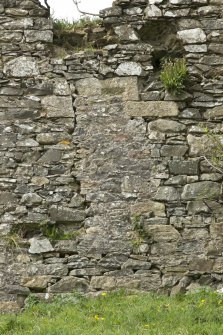 South east range, detail of blocked opening on outside of south east wall