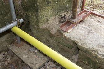 Interior. Ground floor. North wall. Detail of floor joist holes. 