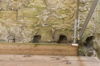 Interior. Second floor. South wall. Detail of floor joist holes.