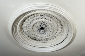 Tax hall mezzanine. Detail of ceiling rose.