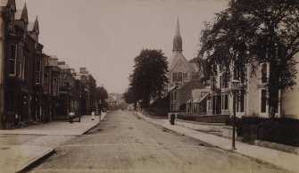 General view of Henderson Street, Bridge of Allan, from SE, including Royal Hotel and United Presbyterian Church.
Titled: 'Royal Hotel and Stirling Road, Bridge of Allan. 2051. J V.'
PHOTOGRAPH ALBUM No 11: KIRSTY'S BANFF ALBUM