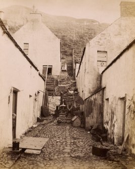 View of children in Gardenstown village.
Titled: 'Gardenstown - Banff'.
PHOTOGRAPH ALBUM NO 11: KIRSTY'S BANFF ALBUM.