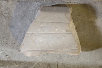 View of medieval cross slab fragment.