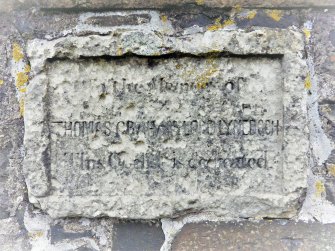 View of plaque on the SE side of the obelisk.