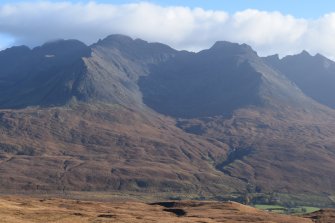 General view of the Cuillin showing the lazy beds behind Glebrittle House