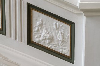 Main stair. Detail of plaster wildlife panel.