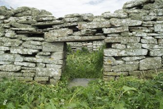 South range, barn, detail of opening in south wall for winnowing grain