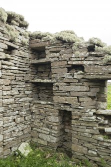 South range, west end, detail of shelving and cheese press