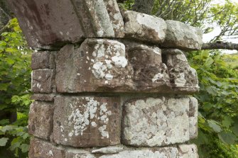 Archway leading to walled garden, detail of re-used carved capital