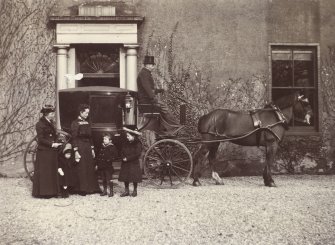 View of coach and horse in front of entrance doorway, titled 'Place of Bonhill 1900, "Hanna" on box'; Mrs Stanley, Mother, Dorothy, Marjorie, Robertson'.
PHOTOGRAPH ALBUM NO.116: D M TURNBULL