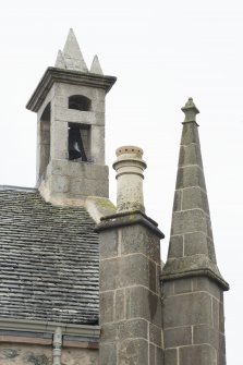 Detail of chimney and bellcote.