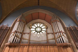 View of organ pipes and rose window