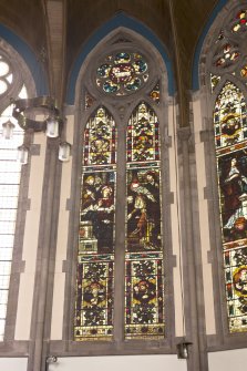 View of stained glass window in chancel