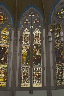 View of stained glass window in chancel