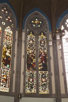 View of stained glass window in chancel