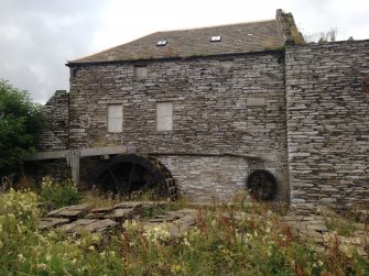 Achingale Mill, eastern gable showing large mill wheel and small overshot wheel, facing west