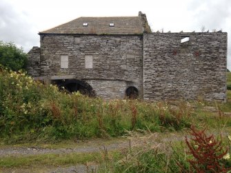 Achingale Mill, eastern gable showing large mill wheel and small overshot wheel, facing west