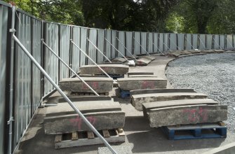 View of numbered stone sections from edge of pool