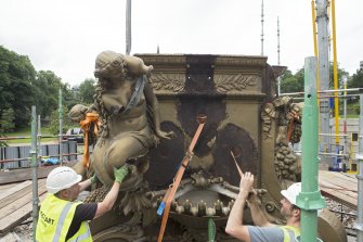 Mermaid being lifted by crane