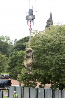 Mermaid being lowered by crane
