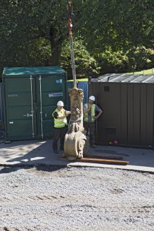 Buttress lowered onto wooden planks