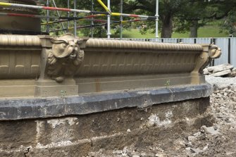Detail of pool edge with decorated heads