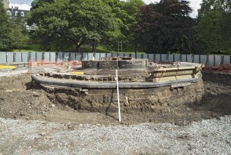 View showing fountain removed showing the stone foundations and the shaps of the pool with its cast iron elements and its basin profile