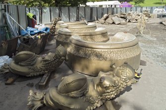 View of two mermaids and four large bowls after removal