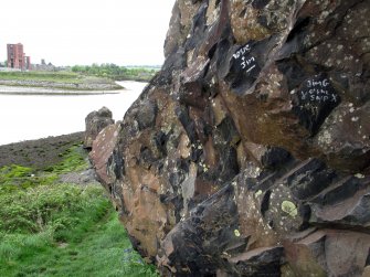 Detail view of graffiti on west edge of Eagle Boulder. It reads 'Rosie & Jim' and refers to the climbing problem that begins here.