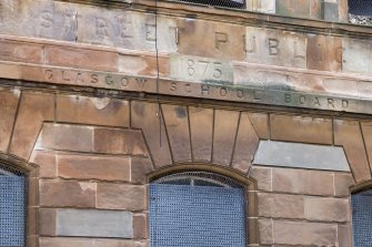 North building. Main elevation. Detail of lettering.