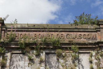 Detail of 'School board of Glasgow' lettering.