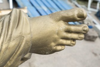Detail of foot of statue.
